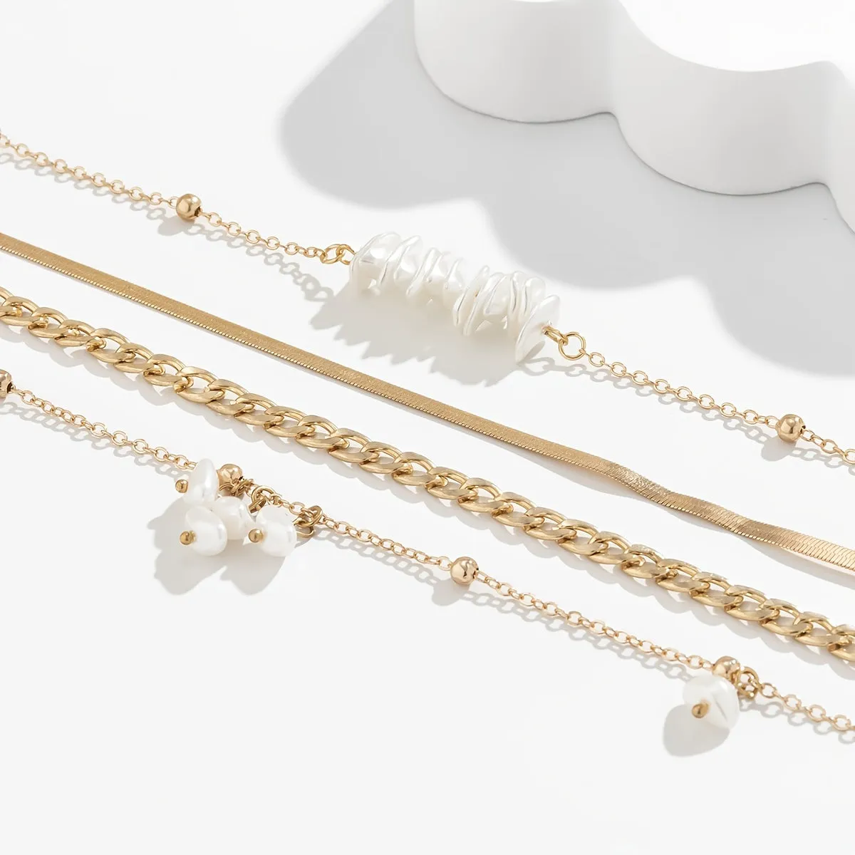 4-Piece Pearl Tassel Necklace Set: Add a Touch of Elegance to Your Look!