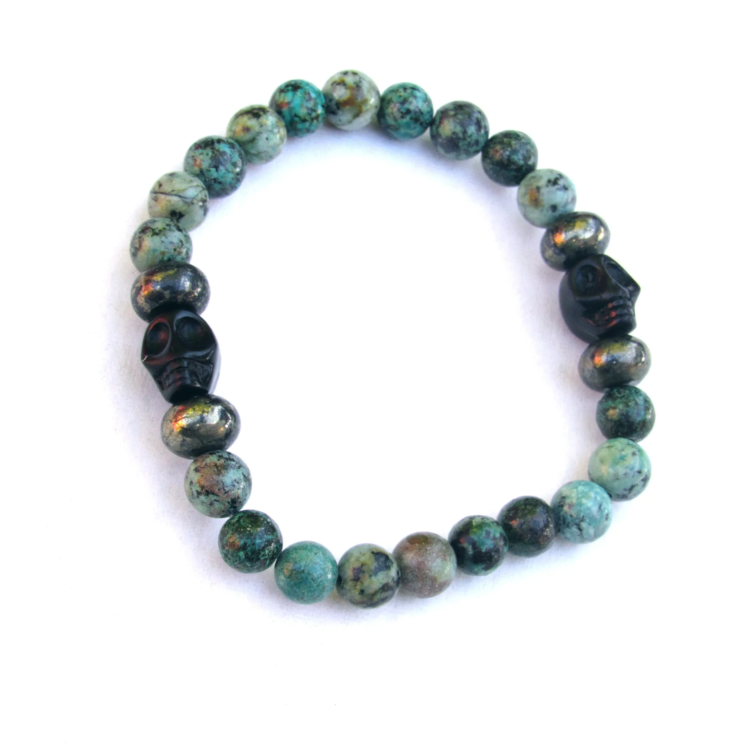 African Turquoise, Pyrite, and Howlite Skull Men’s Stretch Bracelet