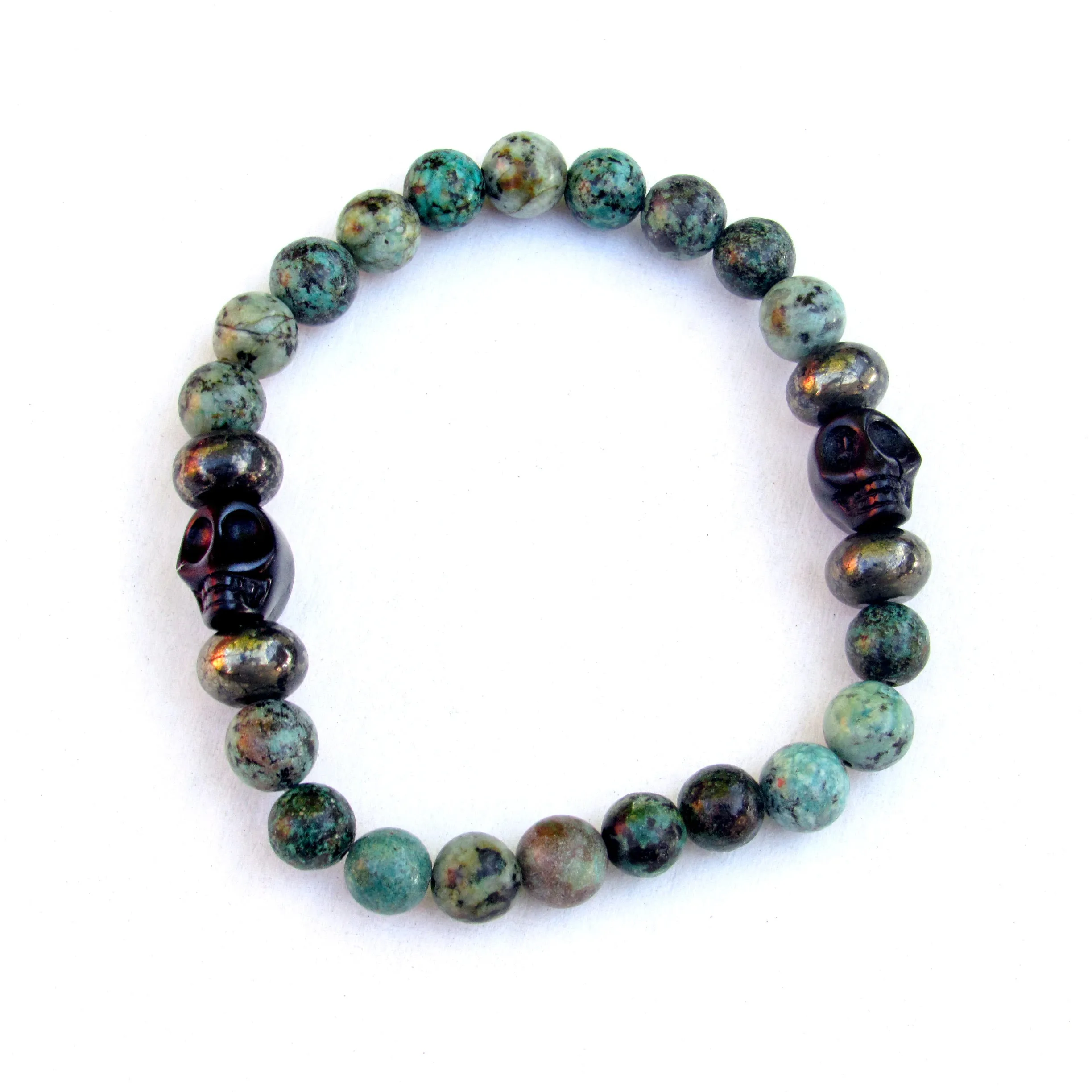 African Turquoise, Pyrite, and Howlite Skull Men’s Stretch Bracelet