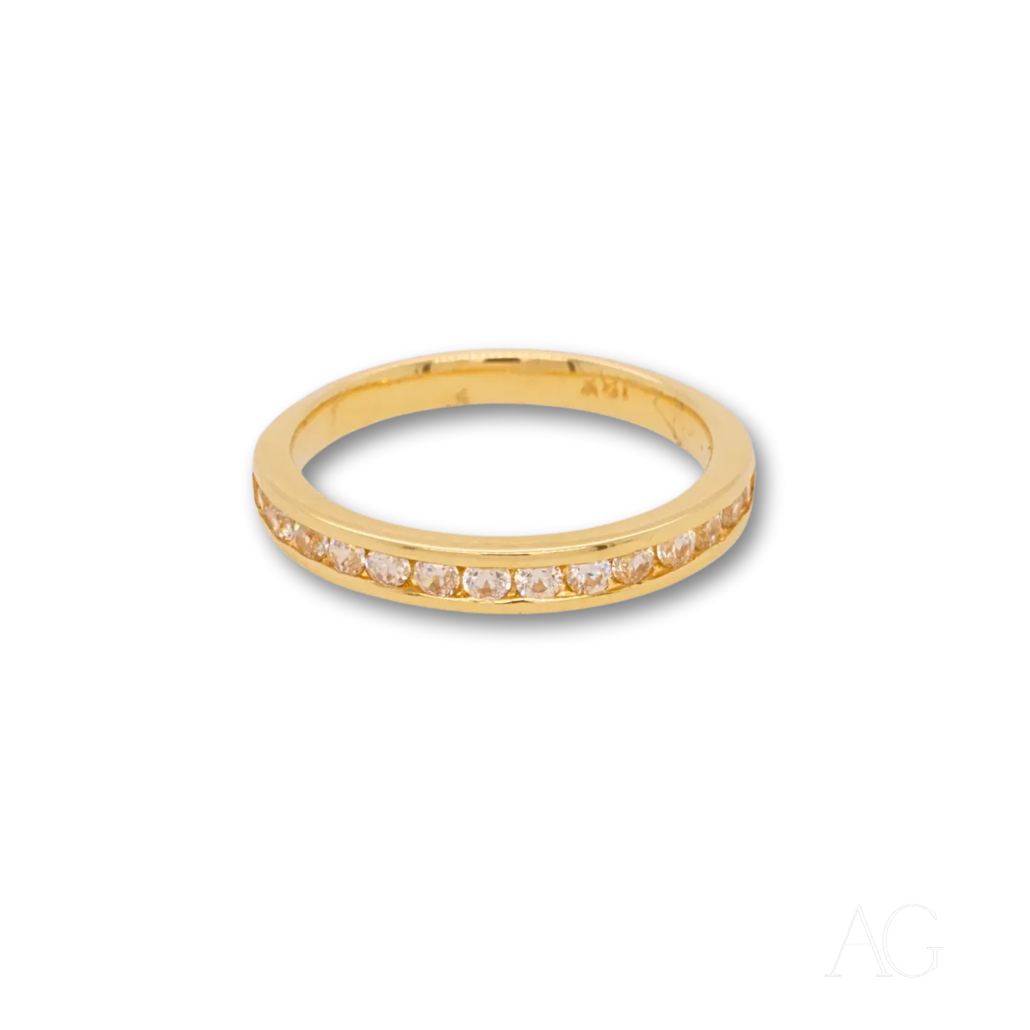 Essence of Radiance: The 18k Gold Ring Adorned with CZ