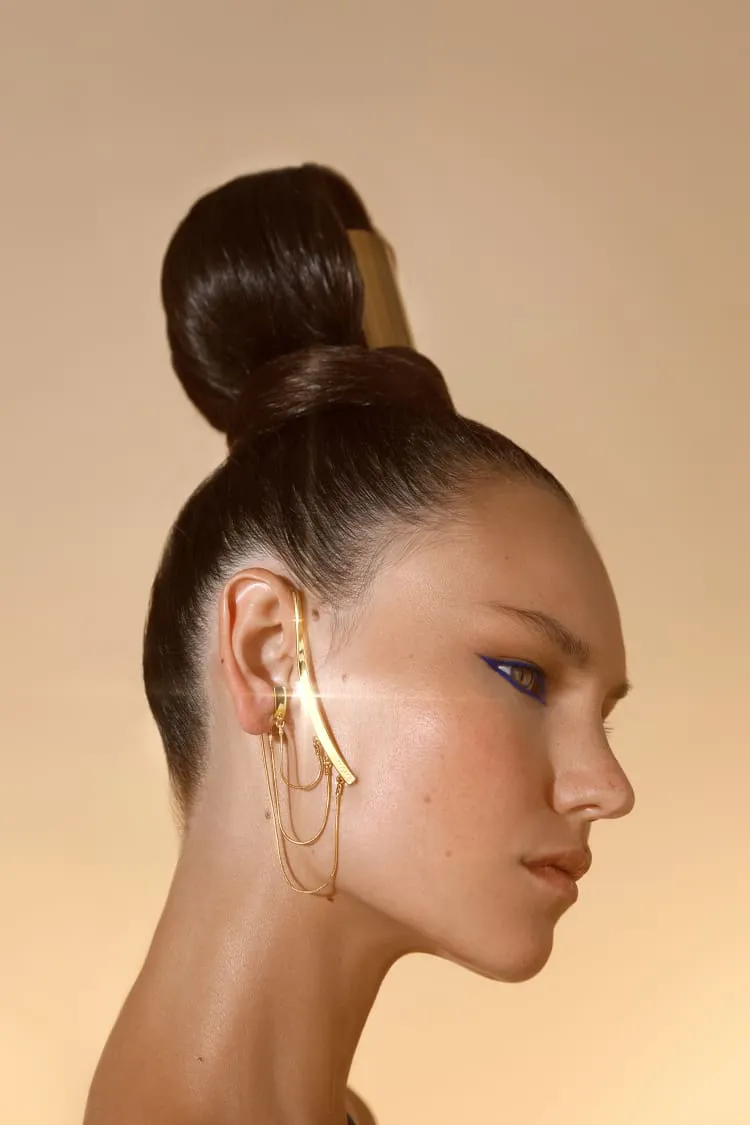 gold ear-cuff with draped chain